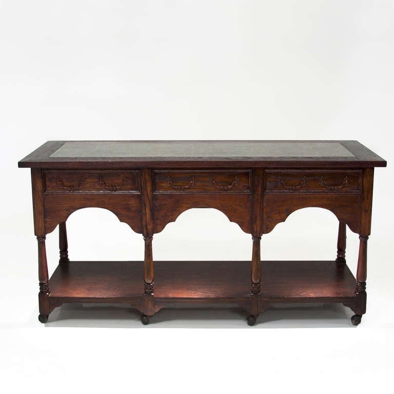 American Hollywood Regency French Carved Oak Console Table on Casters For Sale