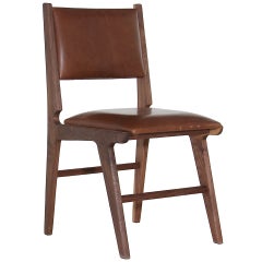 The Mejia Dining Chair In Solid Walnut by Thomas Hayes Studio