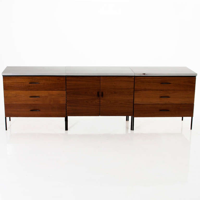 A unique set of 3 Walnut cabinets with black iron frames and pulls and solid bleached Walnut tops. They can be aligned in a row to form a single cabinet, dresser, credenza  or be separated to form 2 or 3 smaller pieces. The solid 1