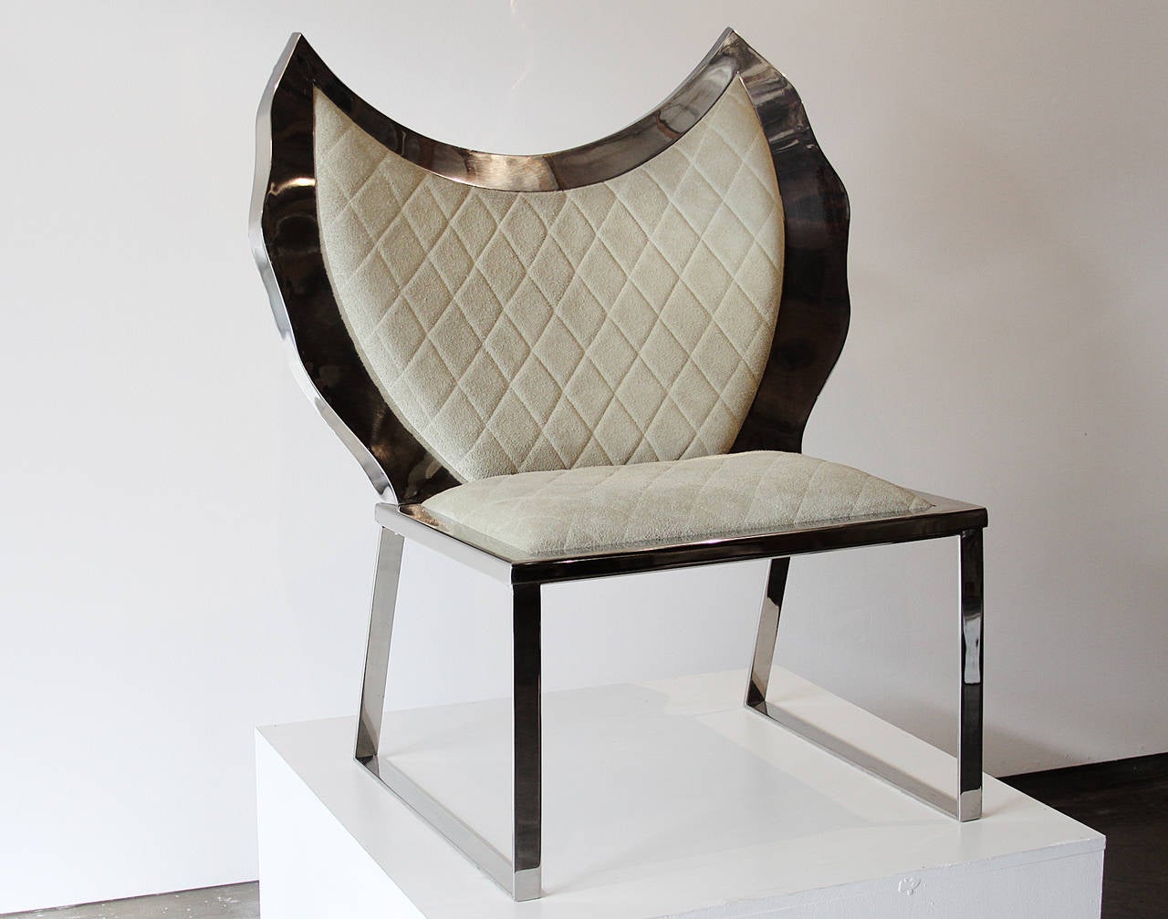 A one of a kind chair by Brazilian designer Alê Jordão. The frame is made of polished stainless steel and the cushion is upholstered in a cream suede.

Many pieces are stored in our warehouse, so please click on CONTACT DEALER under our logo