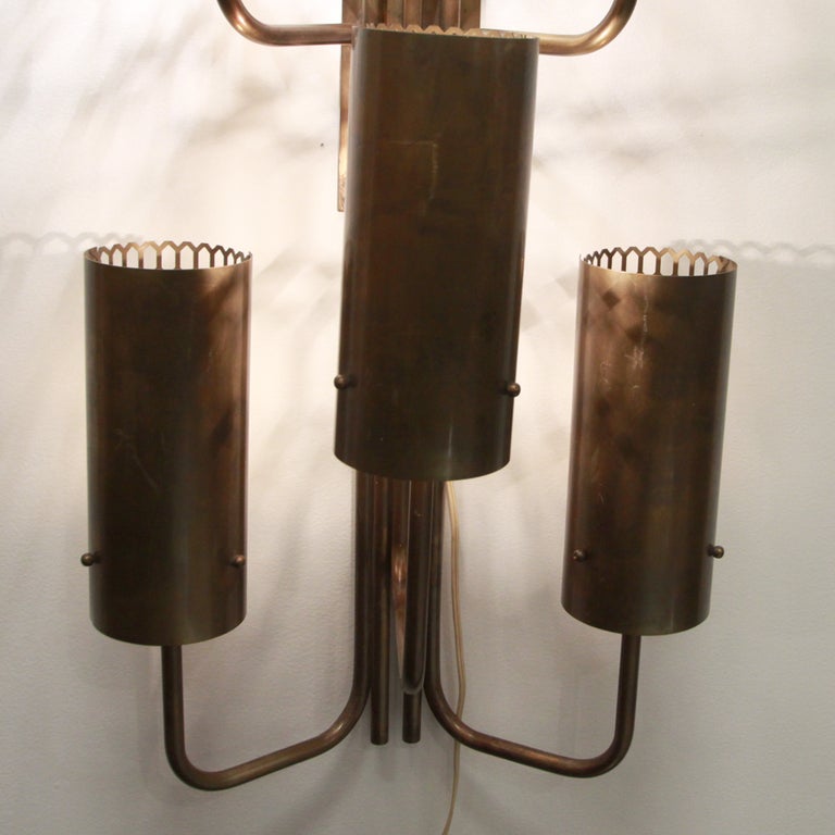 American Large single bronze wall sconce