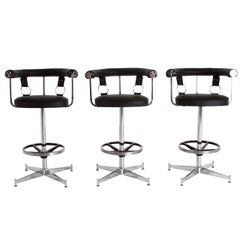 Set of 3 black leather and chrome swivel bar stools