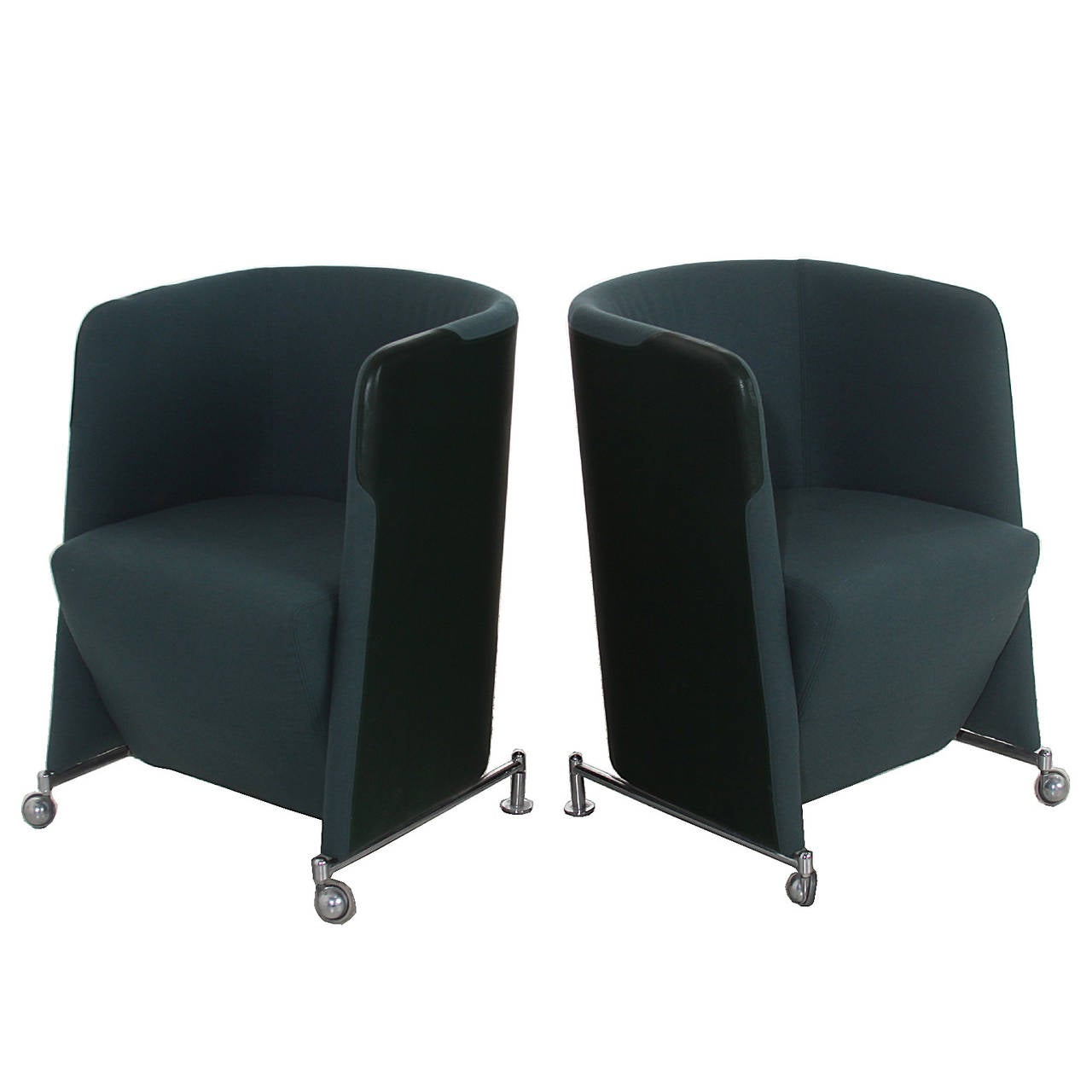 A pair of interesting Swedish side chairs with chrome bases and combined green wool fabric and leather upholstery. Comfortable but slim in profile and upright.

Many pieces are stored in our warehouse, so please click on CONTACT DEALER under our