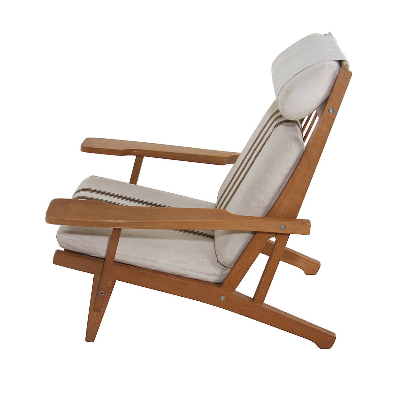 Danish Pair of Hans Wegner GE375 oak and fabric lounge chairs