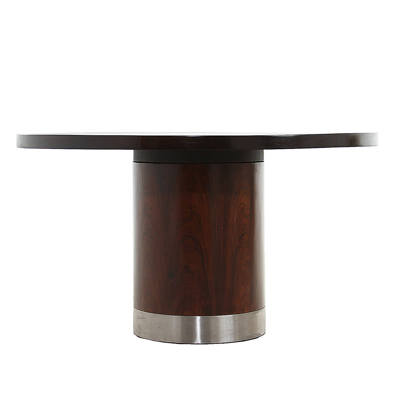 A beautiful exotic hardwood dining table by Brazilian designer Sergio Rodrigues. The base has a 4