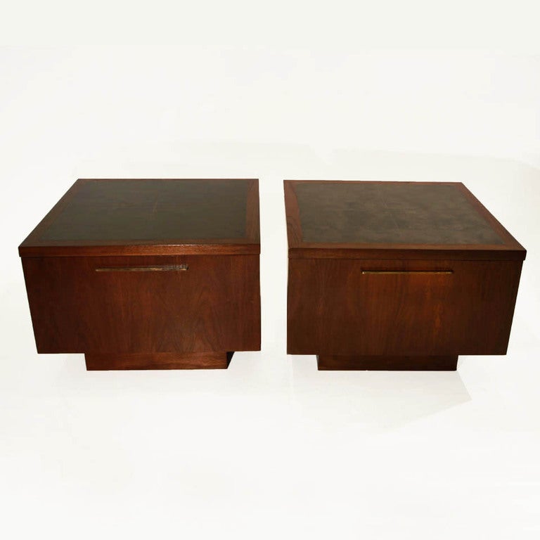 Pair of Walnut end tables by Harry Lunstead.  They are large and square, with tops comprised of four square sheets of acid-etched bronze, and each having a large drop front shelf that pulls out.  They have bronze hardware, and open to ample storage