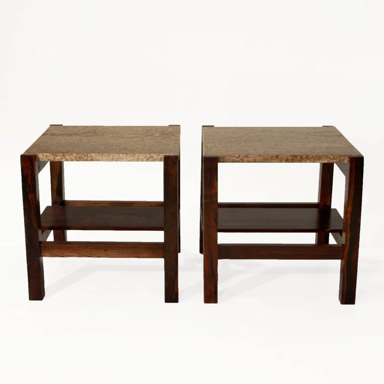 A set of rosewood and granite side tables from Brazil. The bottom platform has a slat placed in the middle rather than extend all the way across. The granite is very colorful and rich; it goes beautifully with the dramatic wood grain of the