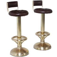 A pair of Brazilian Brass and Leather Stools