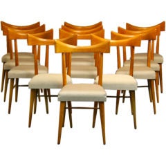Set of 12 curved back dining chairs by Paul Mccobb