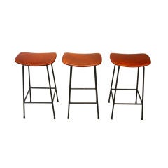 Set of 3 1960's  oxblood leather and iron bar stools