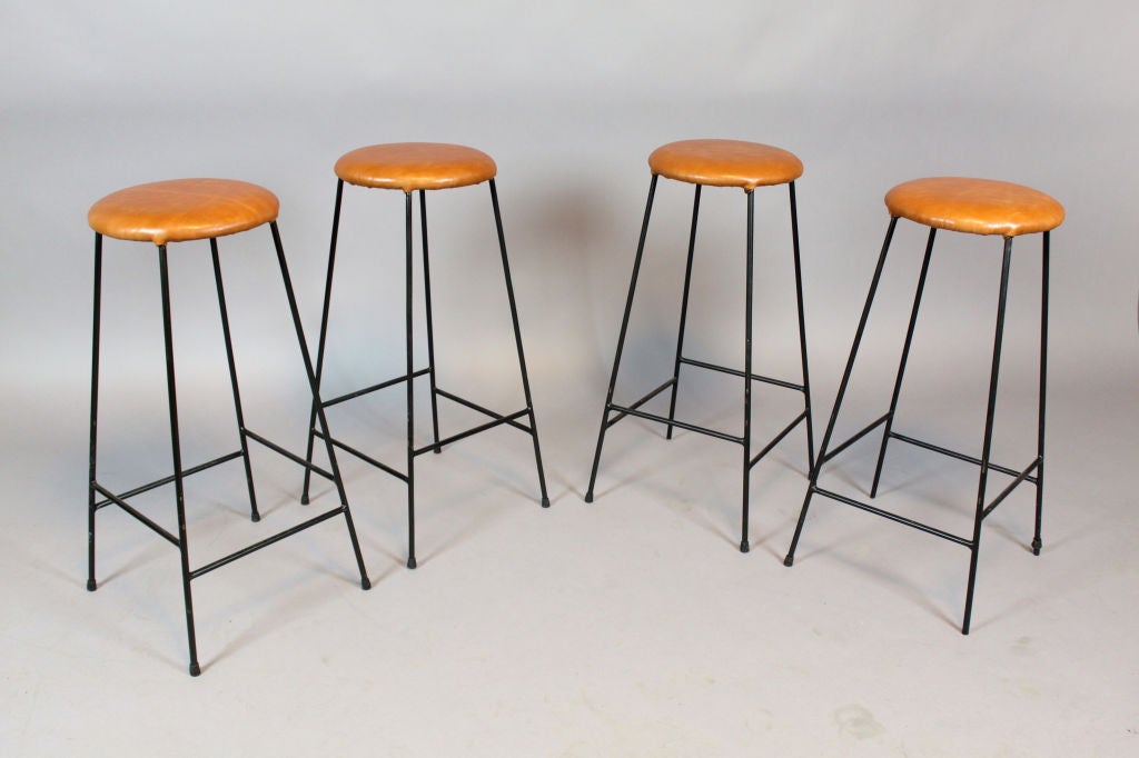 Set of 4 black painted iron bar stools with seats newly upholstered in a distressed caramel leather

Many pieces are stored in our warehouse, so please click on CONTACT DEALER under our logo below to find out if the pieces you are interested in