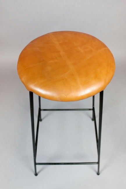 Set of four caramel leather and iron bar stools 1