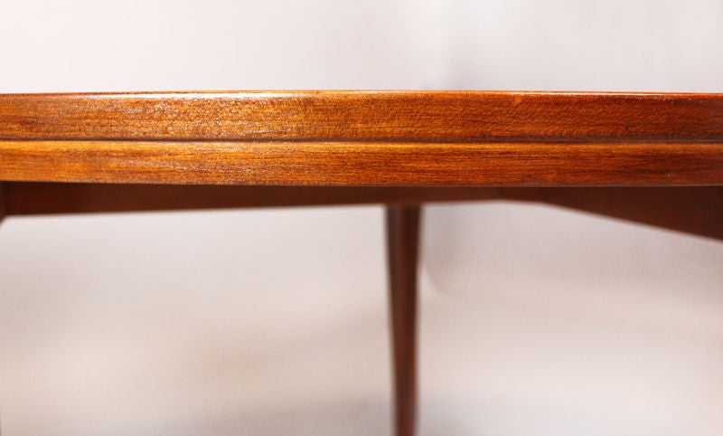 An oval solid cherrywood dining table with sculptural legs designed by Ray Leach. A matching set of four chairs is also available.
We are pleased to present this exquisite collection of restored sculptural wood furnishings by little-known