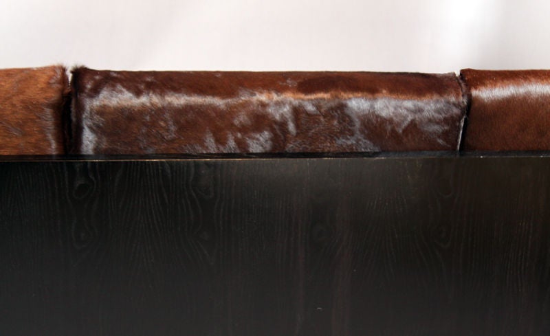 Mid-20th Century Ebonized oak, rosewood and brown hair on hide sofa