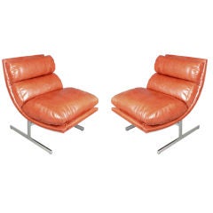Pair of sloped steel & brick leather chairs by Kip Stewart