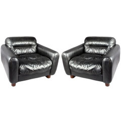 Pair of oversized black leather lounge chairs