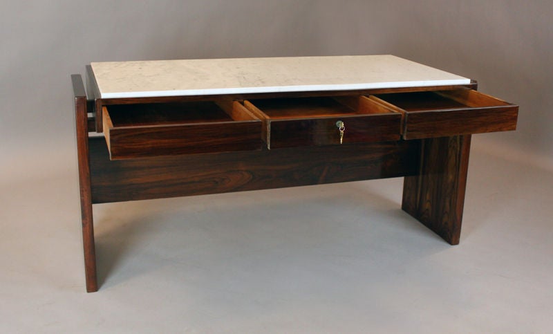 Mid-20th Century Brazilian rosewood and Carerra marble desk by Joaquim Tenreiro