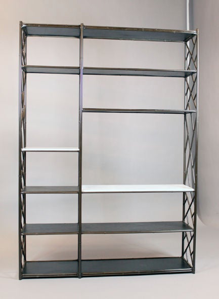 A vintage metal bookshelf with dark bronze-painted finish, black leather covered shelves and two white Carerra marble shelves.<br />
<br />
Currently on display at our space at 1stdibs@NYDC on the 10th Floor of the New York Design Center.