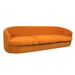 Long curved back sofa by Milo Baughman