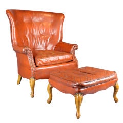 Original leather, oak and bronze chair and ottoman