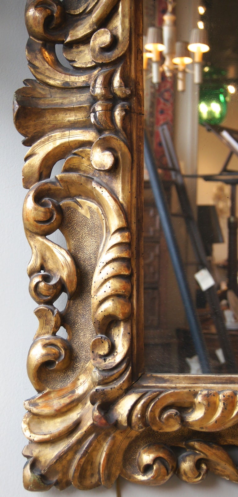 Large Italian Rococo Carved Giltwood Mirror In Good Condition In Kilmarnock, VA