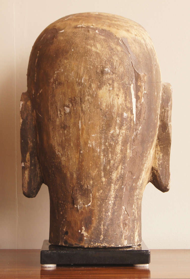 wooden buddha head