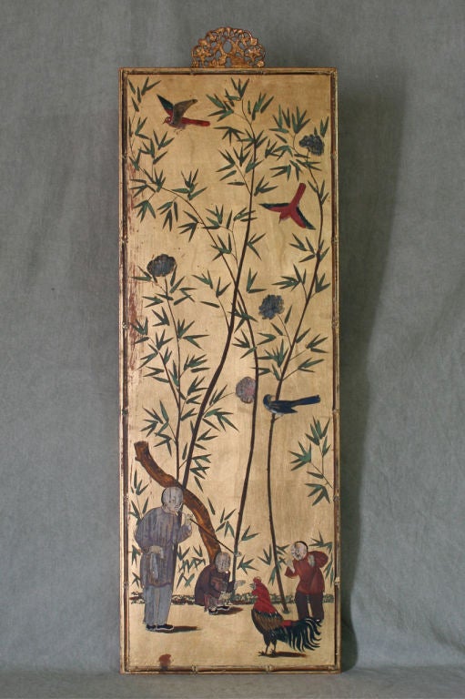 A pair of Italian Chinoiserie gilt panels by Palladio, decorated with figures, flowers and bamboo accented with pierced brass hangers at the top. One is dated 1967, the other, 1968.