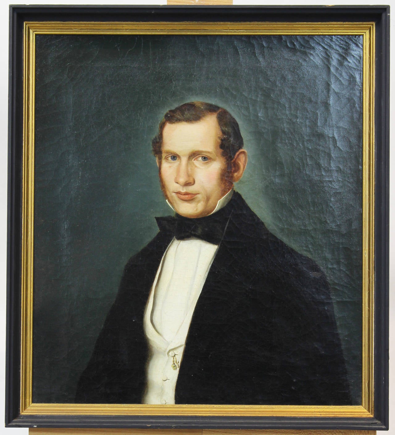 An exceptionally well painted oil on canvas mid-19th century portrait of a prosperous young gentleman.