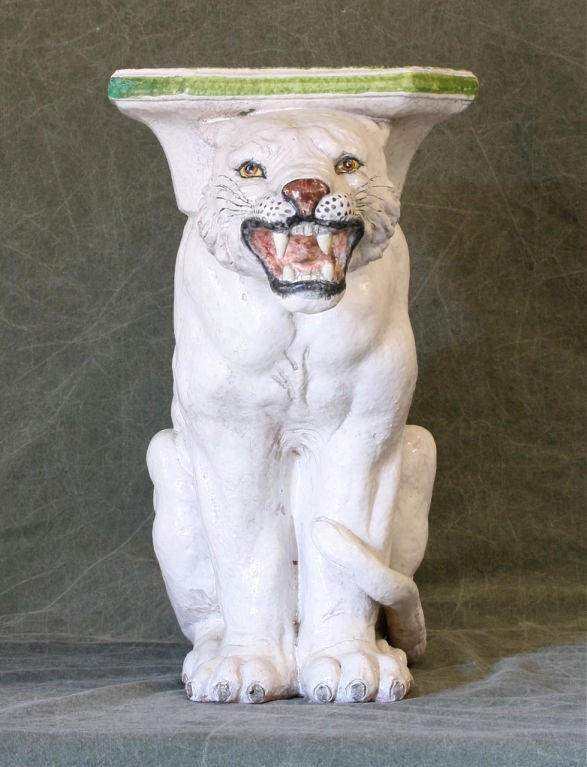 A charming Italian ceramic garden seat or table in the form of a tiger featuring a hand painted face.