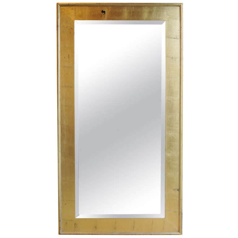 large contemporary bevelled mirror in gold leafed frame at large contemporary bevelled mirror in gold leafed frame at