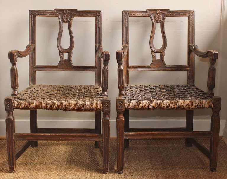 Carved Pair of Early 19th Century French Country Armchairs