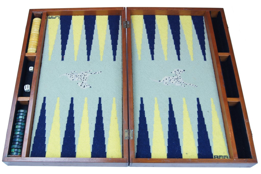 A delightful, hand stitched backgammon bord with Dalmatians worked into the pattern in a classic blue and yellow color scheme.