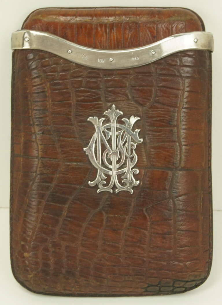 A handsome late 19th century German alligator and sterling silver cigar case. The case is designed to accommodate two to three cigars, depending on ring gauge.