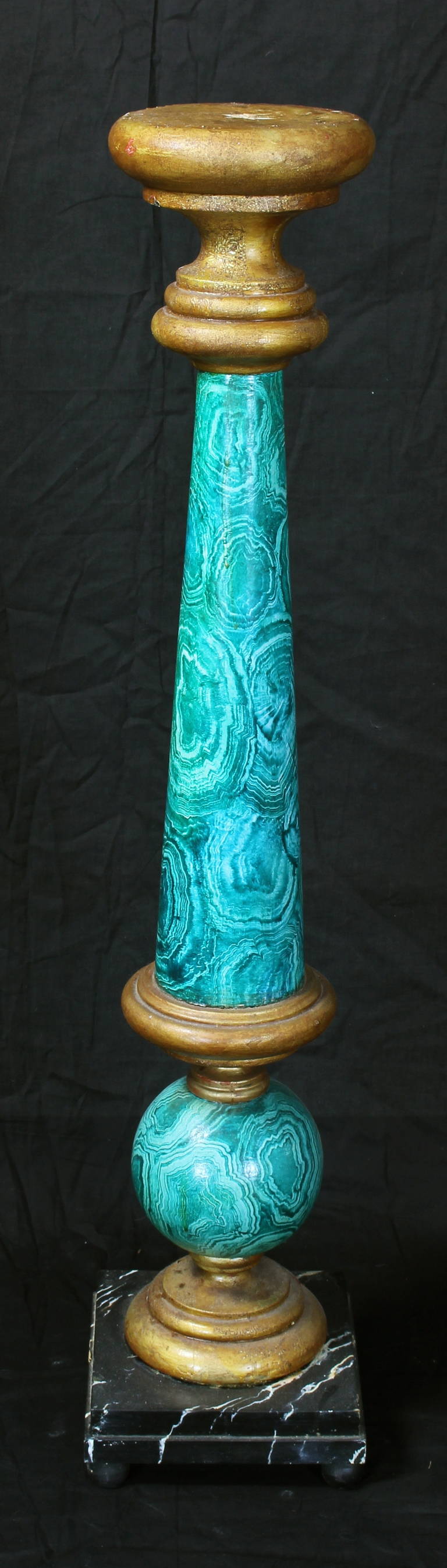 A large and very decorative painted pedestal with faux malachite and gilt decorated column on faux marble base.