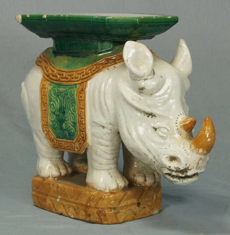 A delightful and very unusual Italian ceramic garden seat dating from the 1930's in the form of a white Rhino.