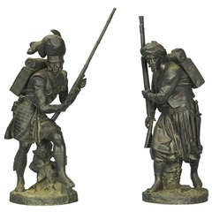 Pair of Cast Bronze Statues