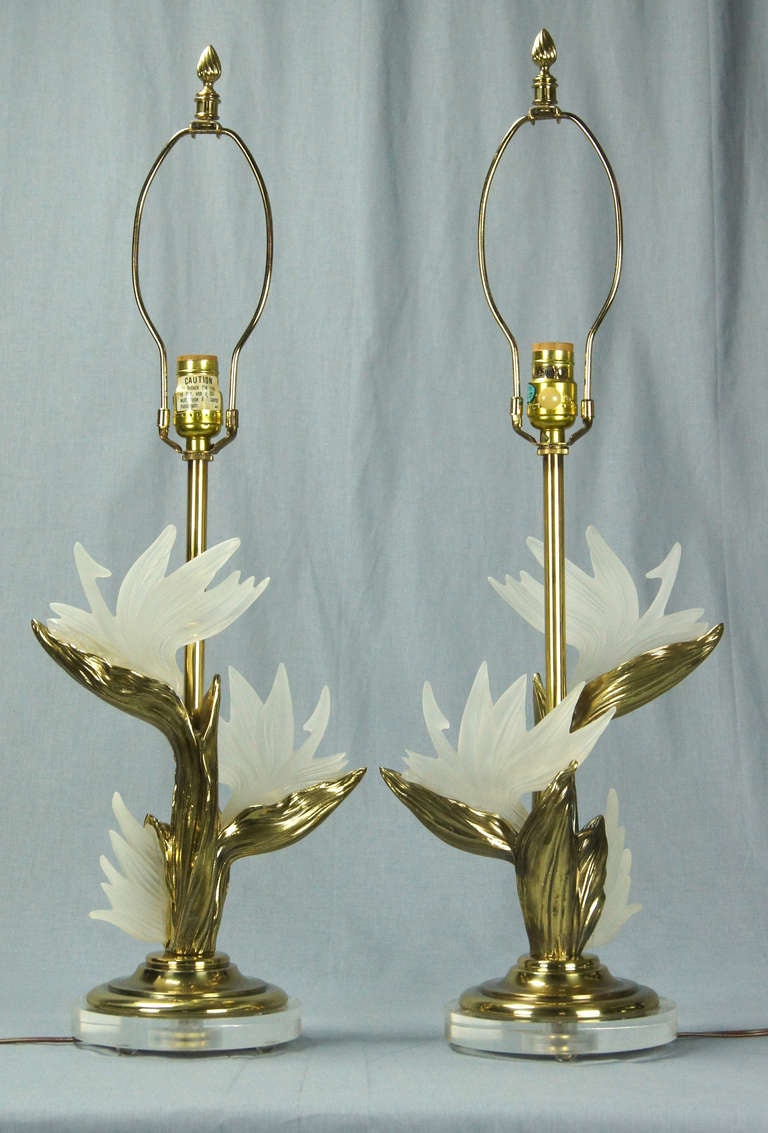 A pair of very high quality brass and lucite table lamps dating from the 1970's by noted lamp maker Stiffel.
