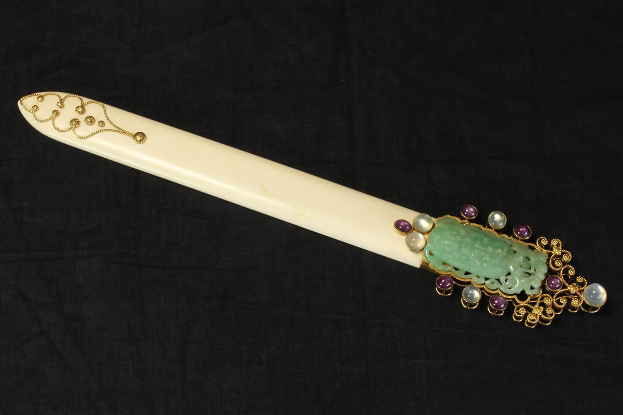 An Italian 18K yellow gold page turner fit for a Maharaja, set with carved Chinese jade, moonstones and amethysts.