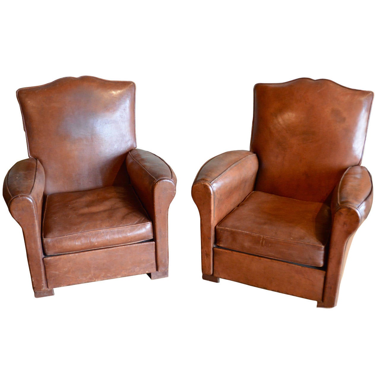 Pair of Leather Art Deco Club Chairs, Mustache Form For Sale