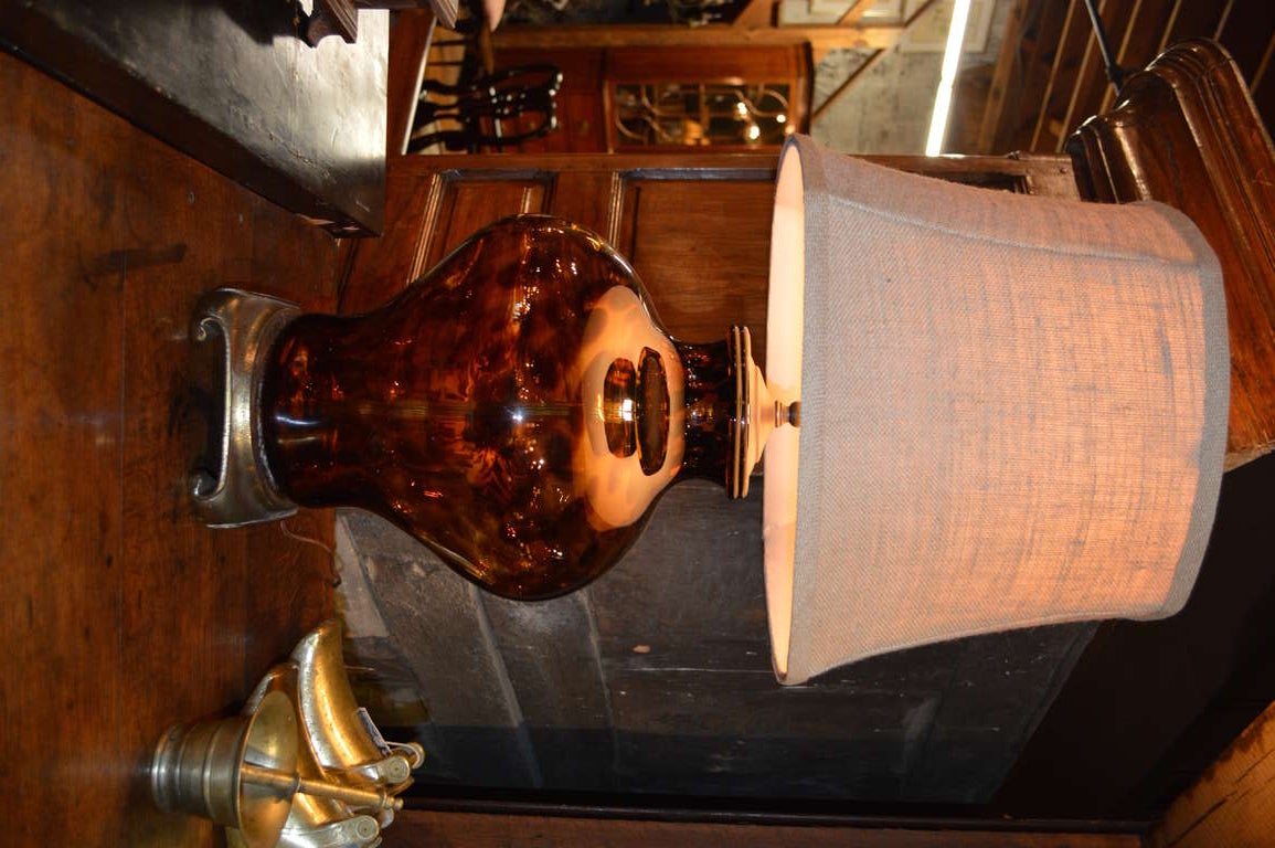 Beautiful hand blown Italian Murano faux tortoise glass lamp with cast gilt bronze scroll base with linen shade