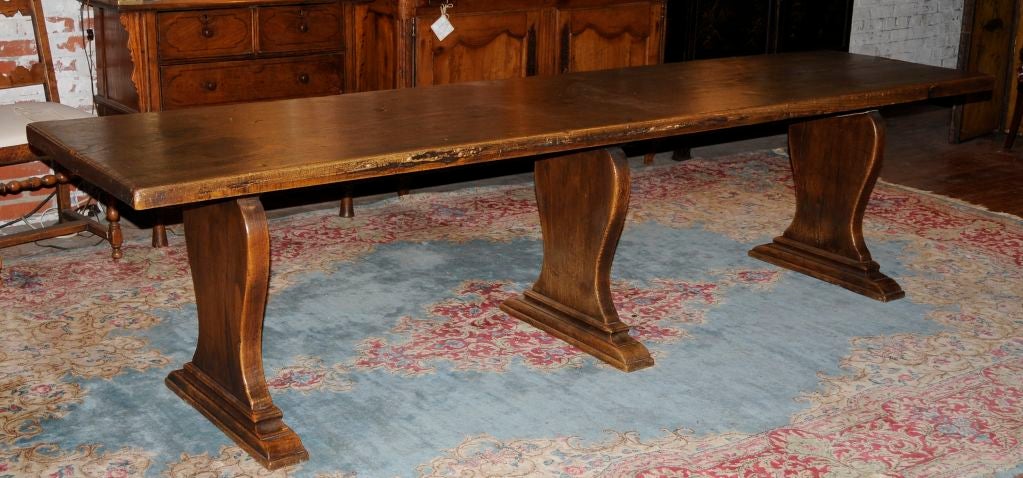 A strong elm one board top French monastery trestle table with elegant simple construction and clean uncluttered lines, 2