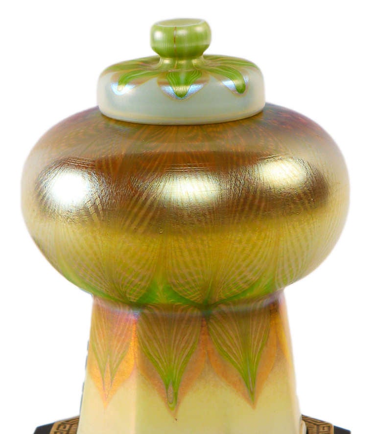 An American Art Nouveau glass, bronze and wood 