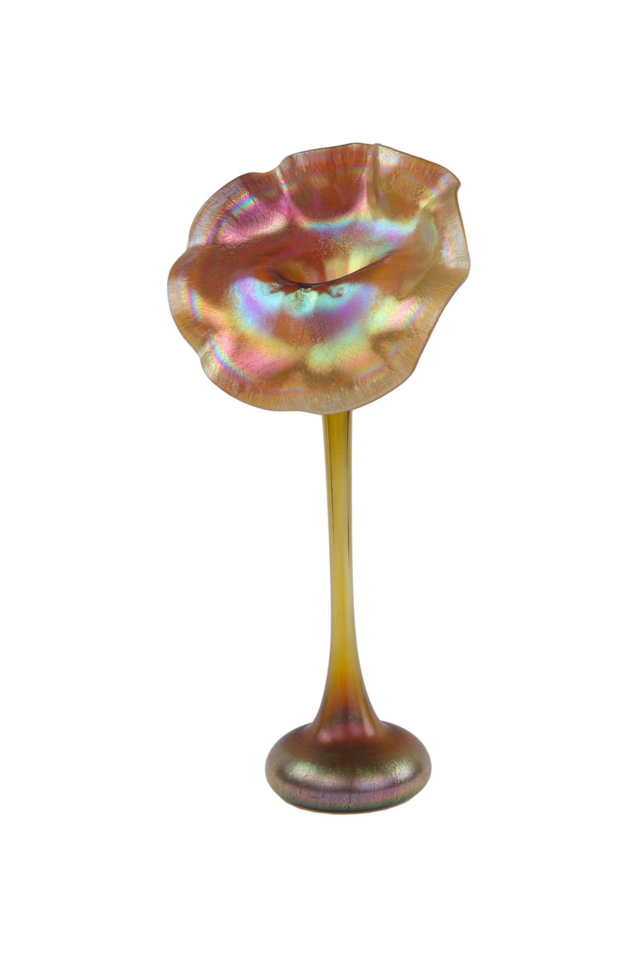 An exceptional American Art Nouveau “Jack-in-the-Pulpit” vase by Tiffany Studios decorated with a large organic opening fully iridized gold, shaded to purple or pink and edged in the curved areas with light tones. The edges of the opening is further