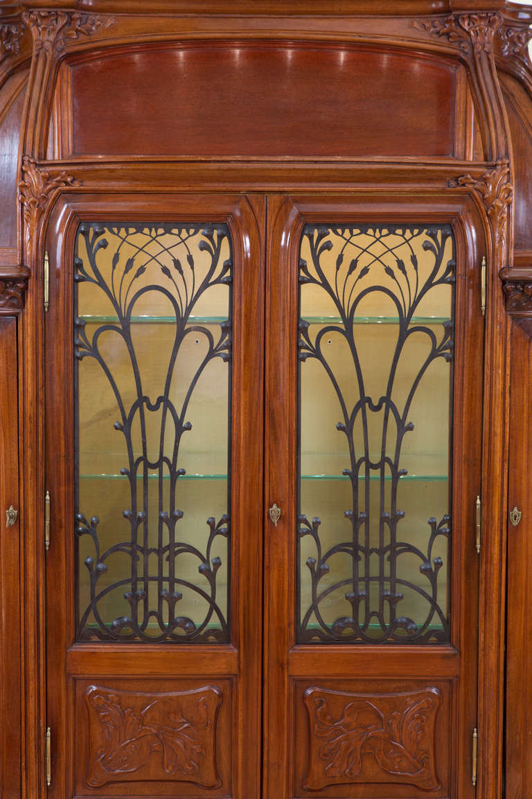 A fine and rare French Art Nouveau carved wood and wrought iron 

Reference: 
