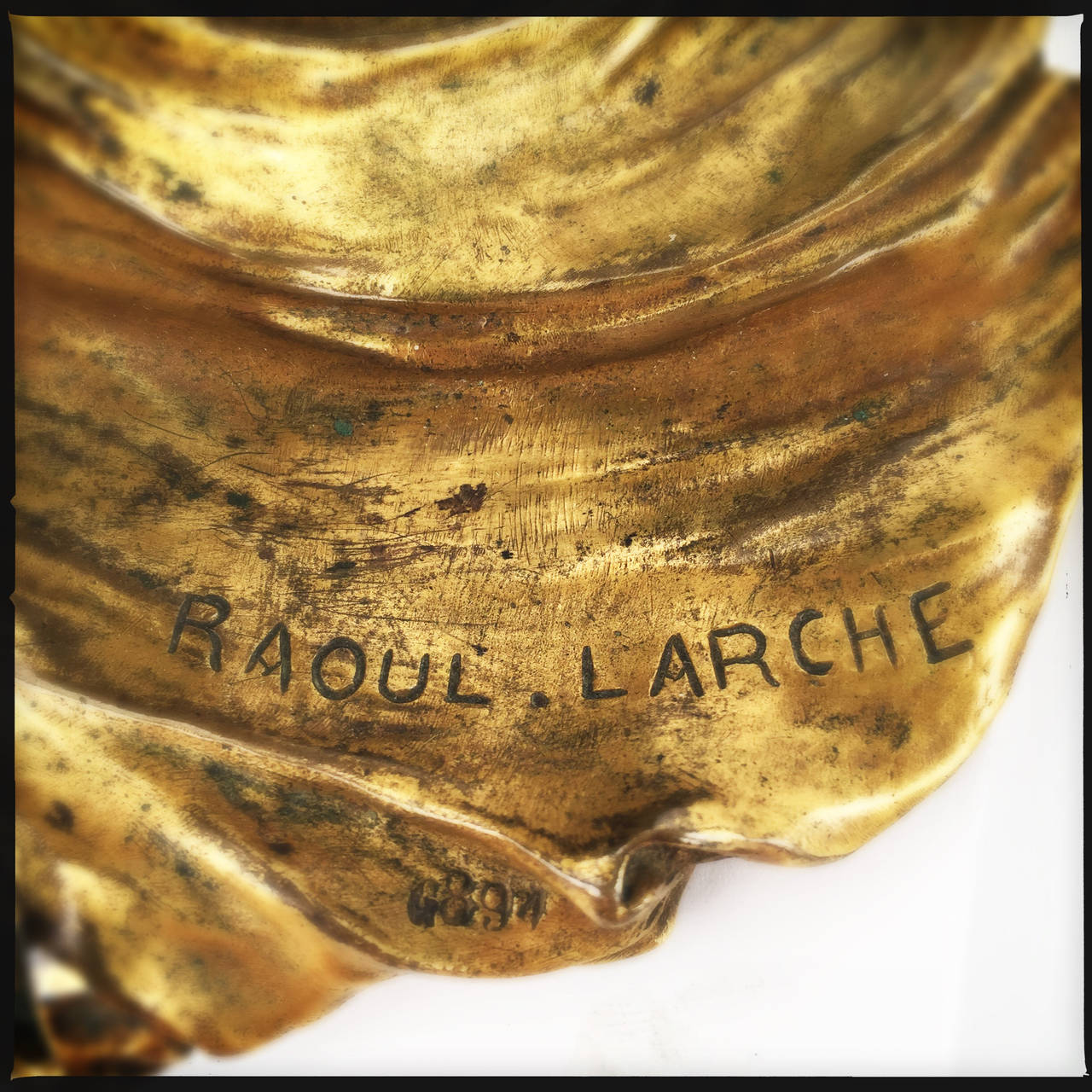 A fine and rare French Art Nouveau gilt bronze sculptural lamp by, François-Raoul Larche depicting the famous American dancer 