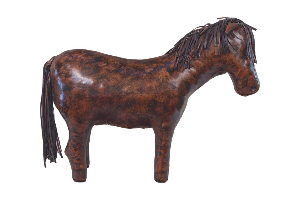 A leather horse  footstool designed by, Dimitri Omersa, manufactured by Omersa and Company, Lincolnshire, UK and retailed by Abercrombie & Fitch Company from 1940s -1960s.