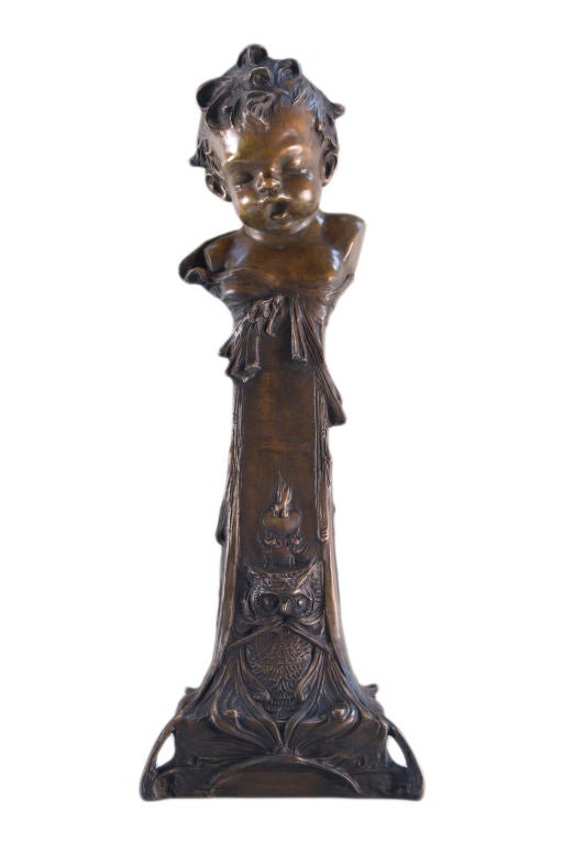 American Art Nouveau patinated bronze sculptural andirons by, Henry Linder of one female child decorated with butterfly and one male child decorated with an owl. <br />
both andirons are signed, 