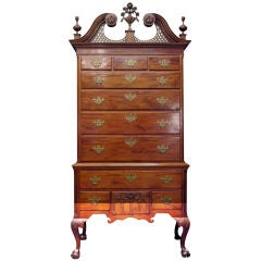 A Chippendale Carved and Figured Mahogany High Chest of Drawers