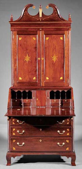 This desk and bookcase is one of the most ambitious Western Maryland examples to survive from the Federal Period.  It hails from Hagerstown, in the northern Shenandoah Valley, and represents the work of a Germanic artisan whose shop was likely