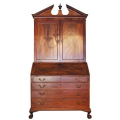 A Fine Chippendale Carved and Figured Mahogany Desk and Bookcase